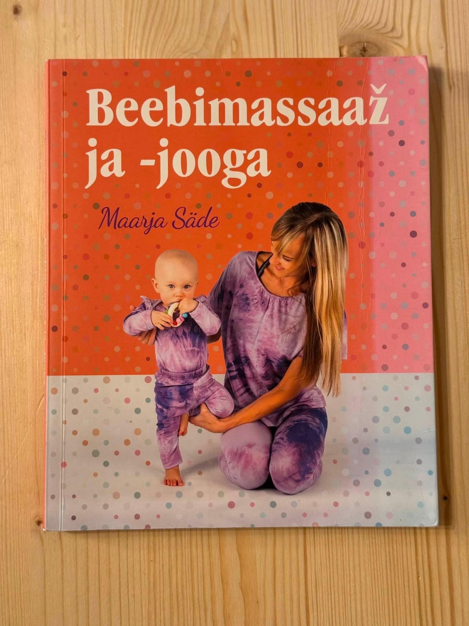 Raamatu „Beebimassaaž ja -jooga” kaas